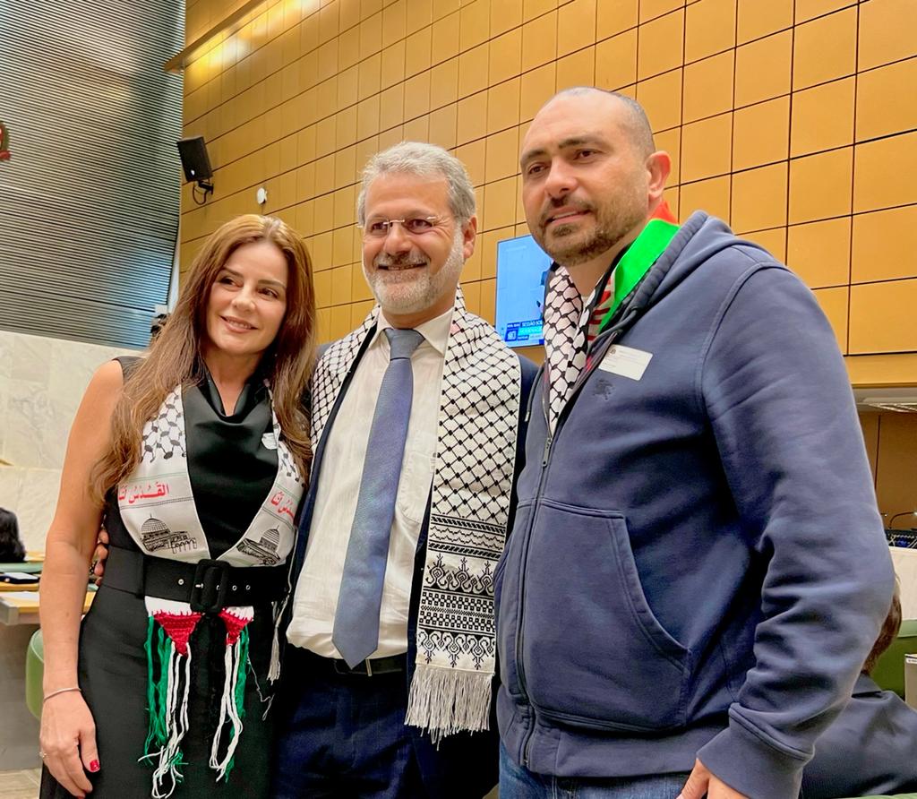 Rabah com os representantes da comunidade palestina no Conscre, Rita de Cássia Halti e Mohamad Salem